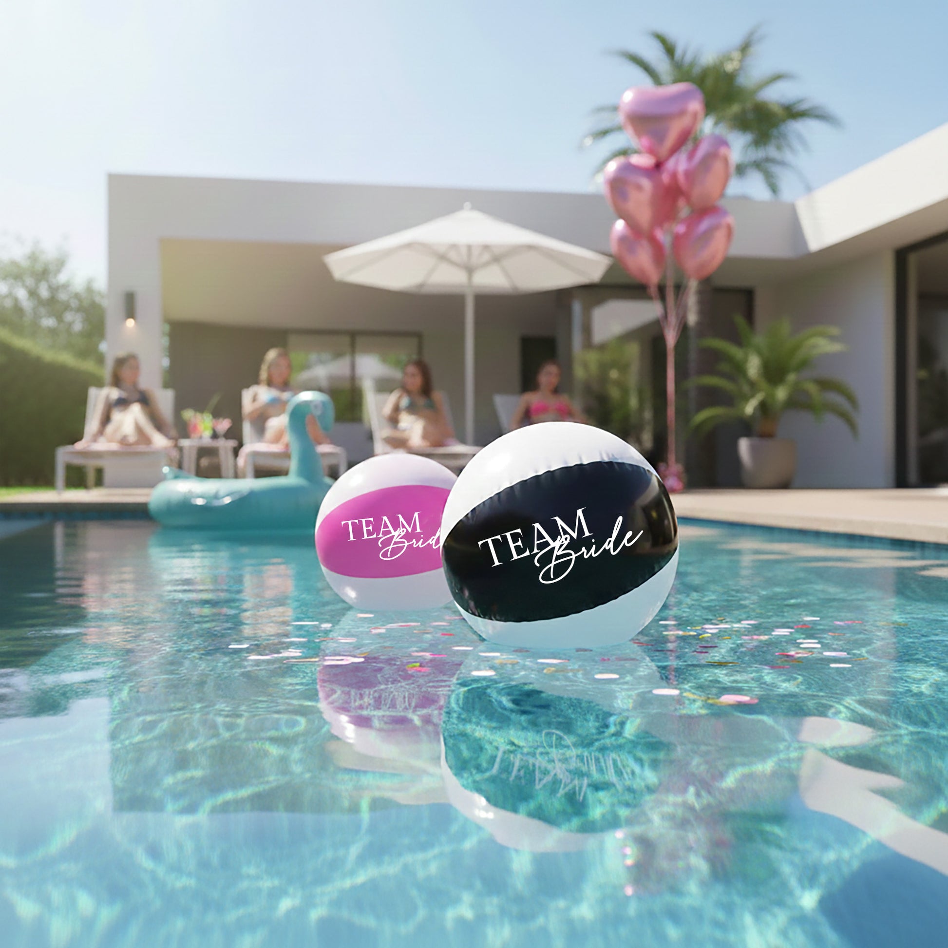Two beach balls with 'Team Bride' text in a pool with balloons in the background.