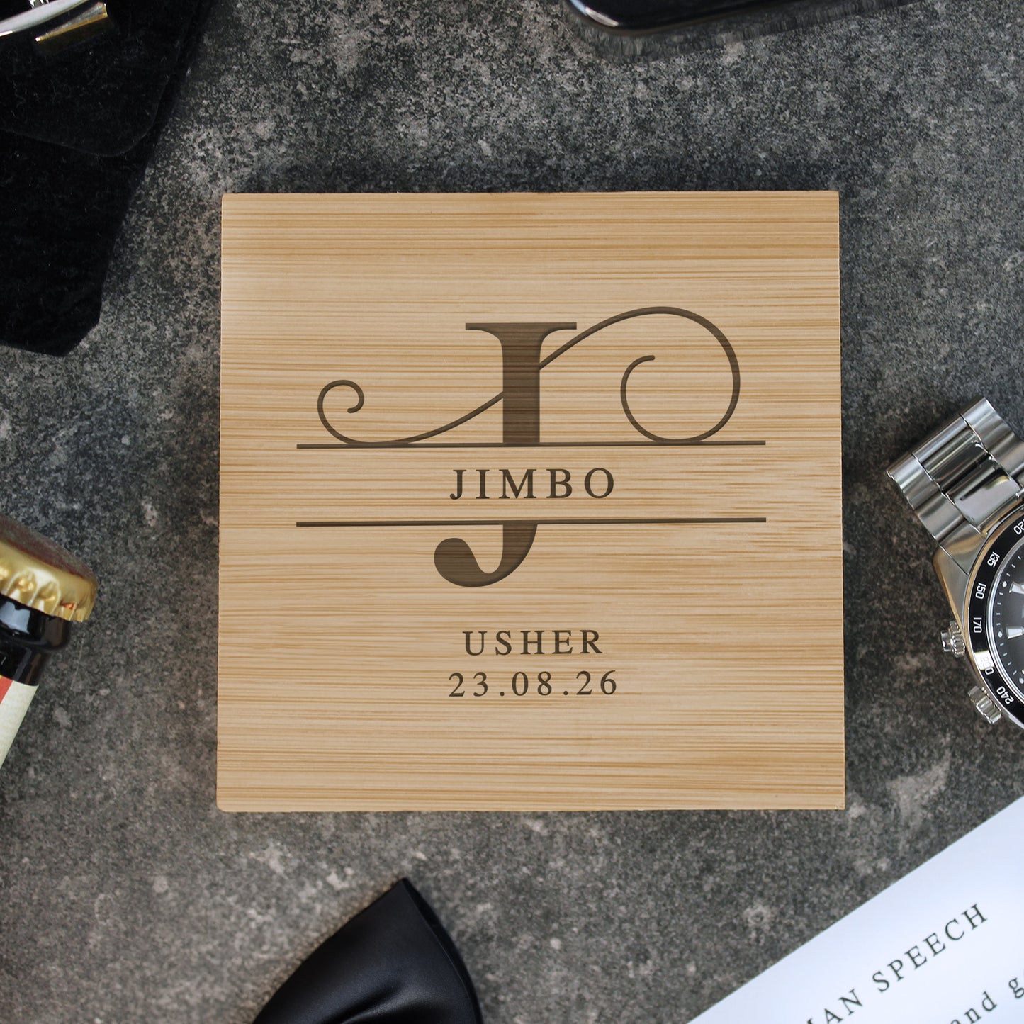 Wooden coaster with engraved text on a concrete surface
