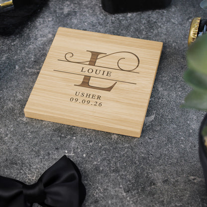 Wooden coaster with engraved text on a gray surface