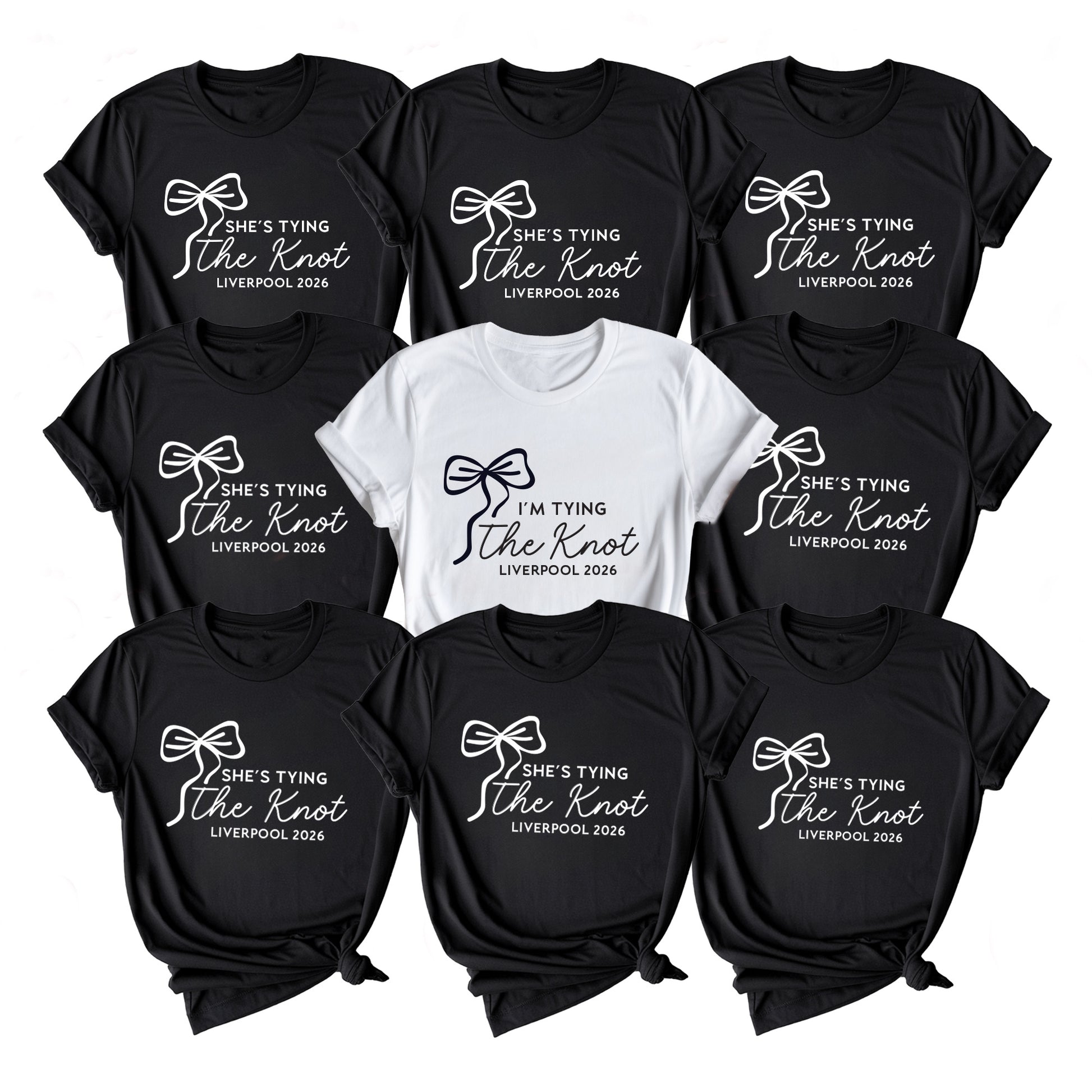 Collection of black and white t-shirts with 'She's Tying the Knot' text on a white background