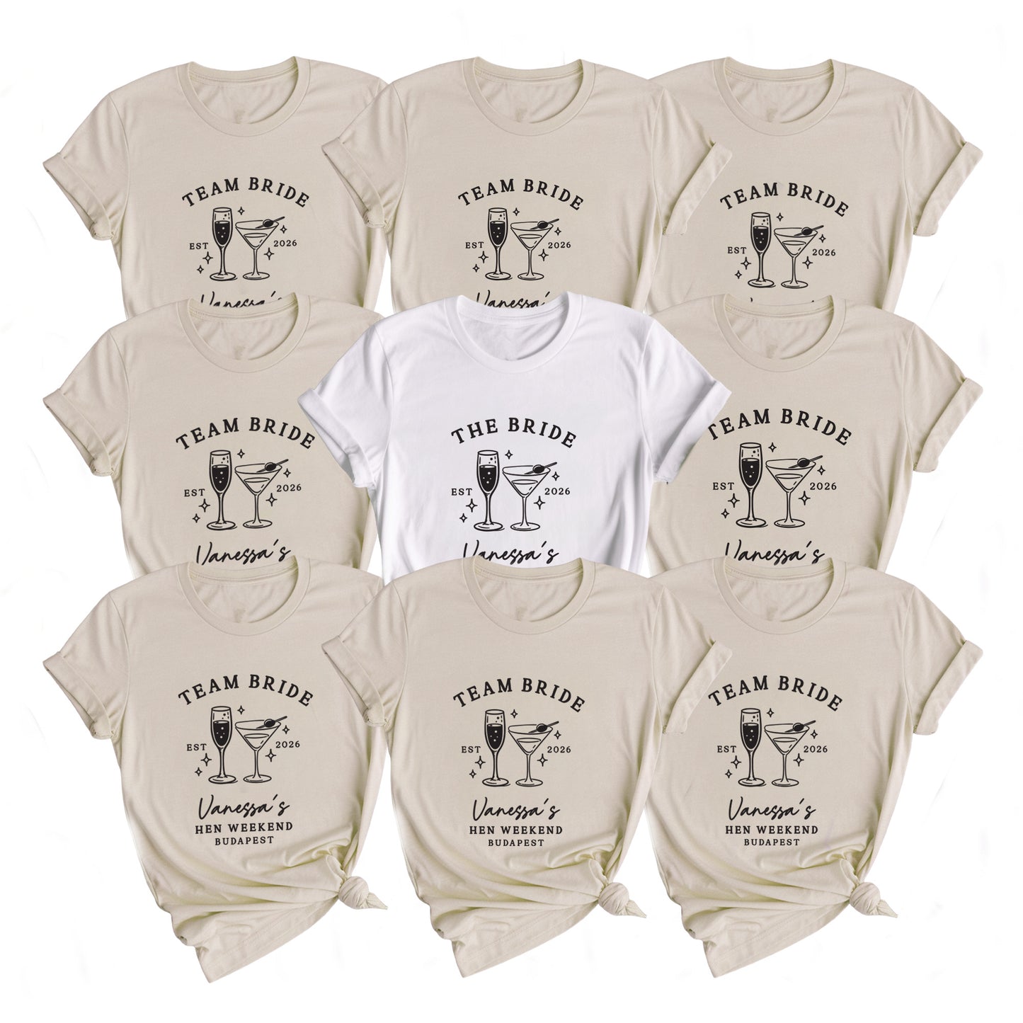Nine short-sleeve graphic T-shirts arranged in a 3x3 grid on a white background. Eight shirts are a warm light beige/cream color and one center shirt is white.